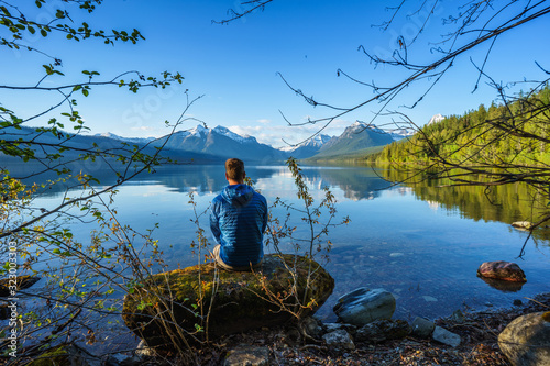 Adventurer at Lake McDonald in Glacier National Park, Montana photo