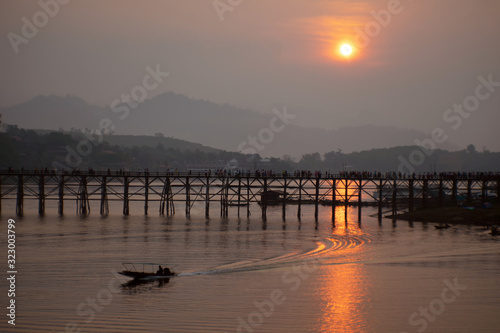 Ancient mon wooden bridge in songgaria river Sangkhla Buri District kanchanaburi thailand.