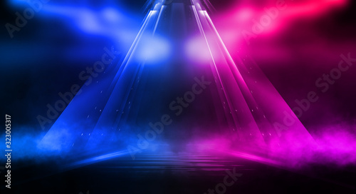 Fototapeta Naklejka Na Ścianę i Meble -  Empty stage, blue and pink, purple  neon, abstract background. Rays of searchlights, light, abstract tunnel, corridor. Dark futuristic background, smoke, smog.