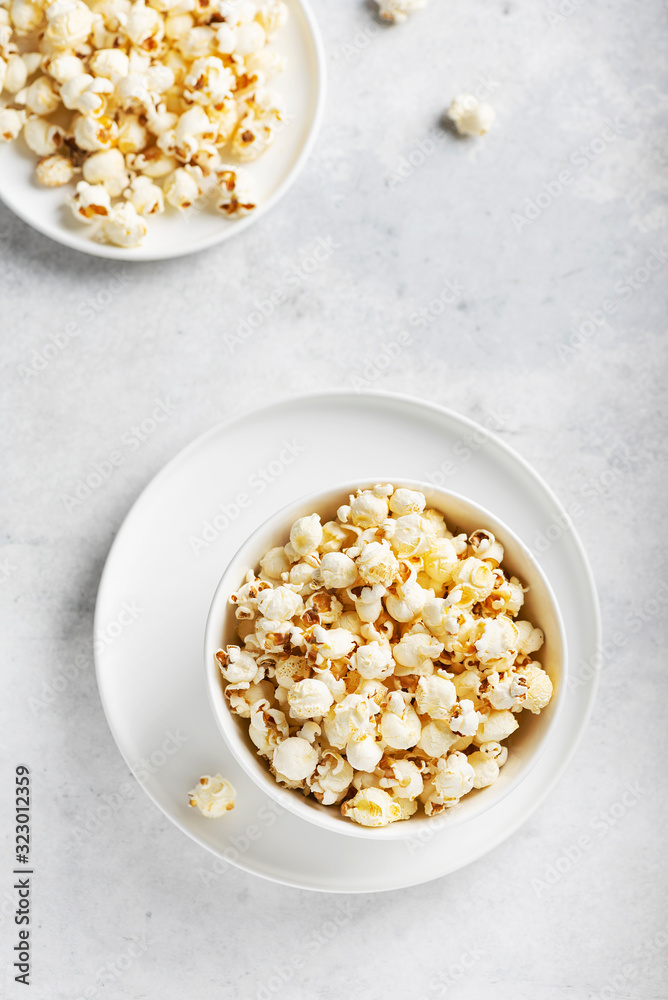 Salt popcorn in the light bowl Salt popcorn in the light bowl