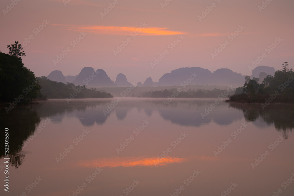 Sunset landscape view with beautiful mountain in Krabi, Thailand.