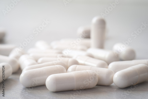 Magnesium citrate  white capsules close up