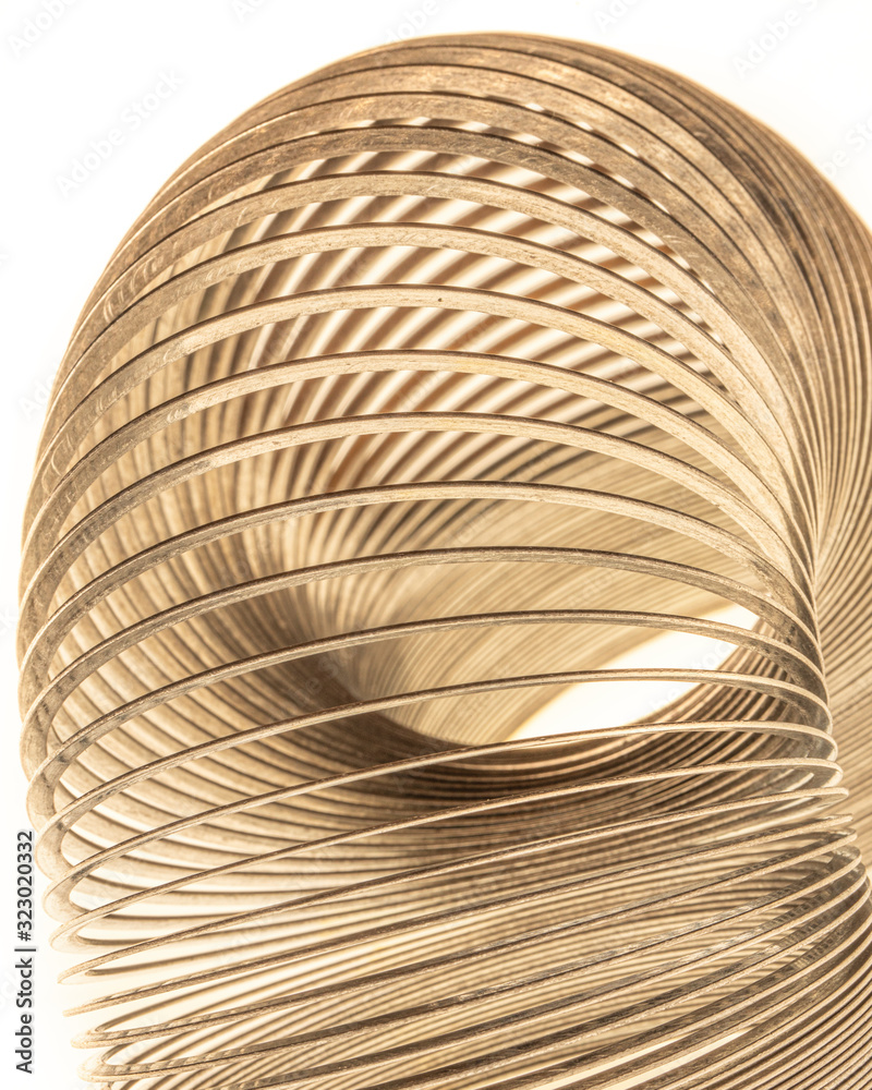 Wall Mural Macro close up of gold slinky