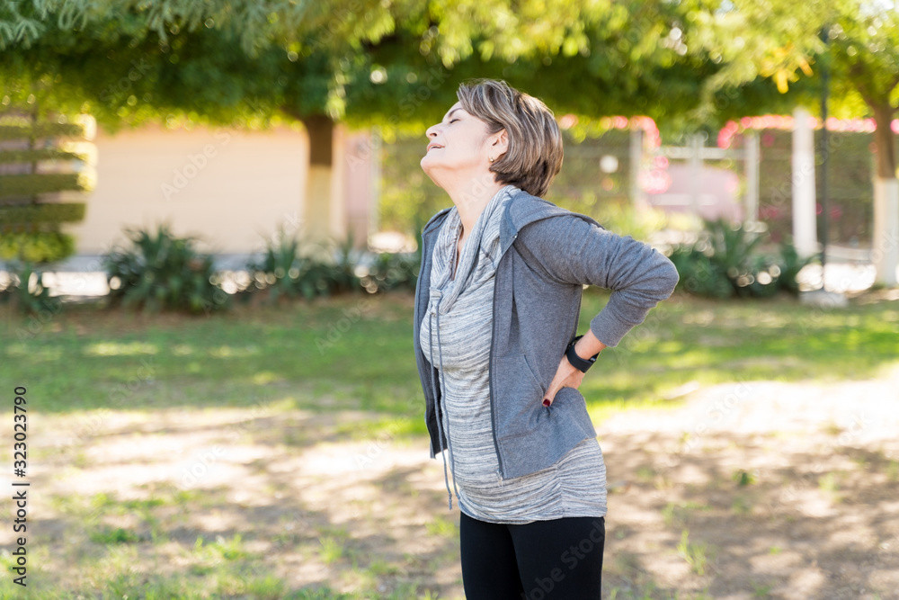Retired Active Woman Suffering From Backache Retired Active Woman Suffering From Backache