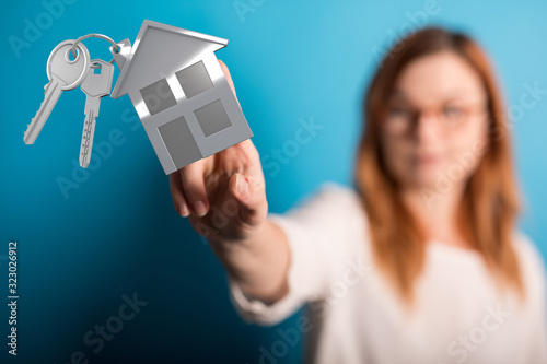 Real Estate Agent house han...