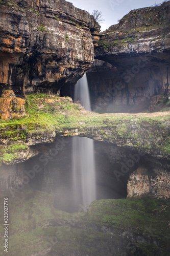 Canvas-taulu Vertical shot of the Baatara gorge waterfall in Northern Lebanon