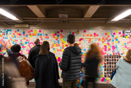New Yorkers are covering the subway station wall in emotional election sticky notes after the presidential election 2016 at Union Square Station New York City NY USA on Nov. 13 2016. photo