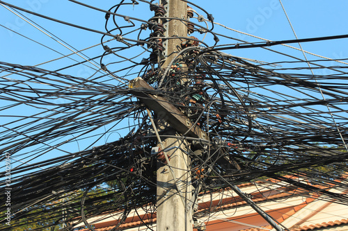 Close-up of Power Cord and Communication Cable Clutter in Chiang mai, Thailand.