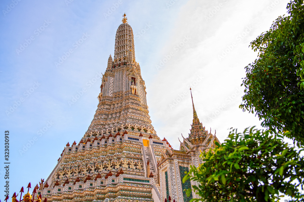Wat Arun Ratchawararam in the morning sky is a beautiful ancient temple built in the Ayutthaya it is where both domestic and international tourists are popular in Bangkok Thailand