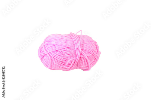 Skein of woolen threads of pink color, isolate. Threads for knitting on a white background. Object for a hobby.