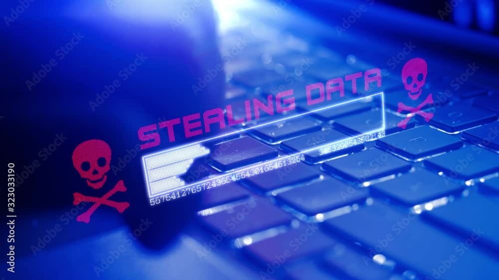 A hacker taps his finger on keyboard of a computer and downloads data from an infected internet server and steals information from the system with a virus or trojan. Streaming and Stealing Data.