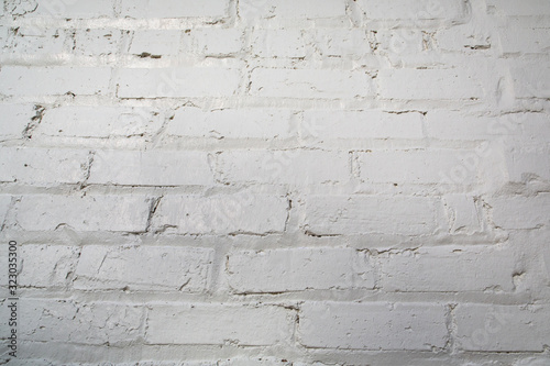 Rough textured white painted brick wall © Ursula Page