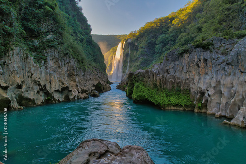 River and amazing crystalline blue water of Tamul waterfall in San Luis Potosí, Mexico photo