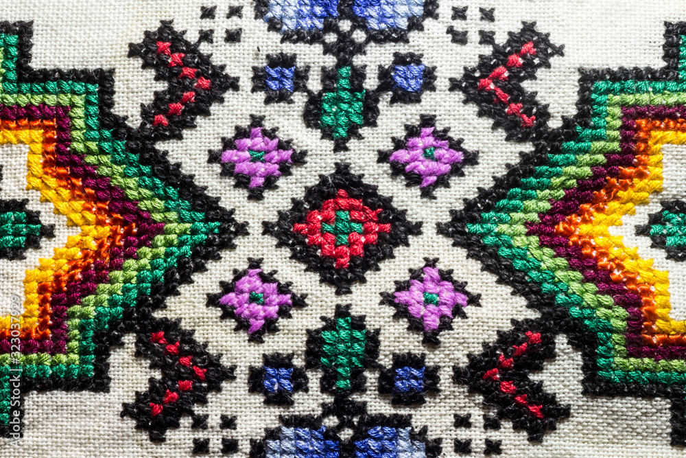 The texture of hand- embroidered , close-up The texture of hand- embroidered , close-up