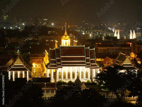 Night view of Bangkok's Metal Castle Temple photo