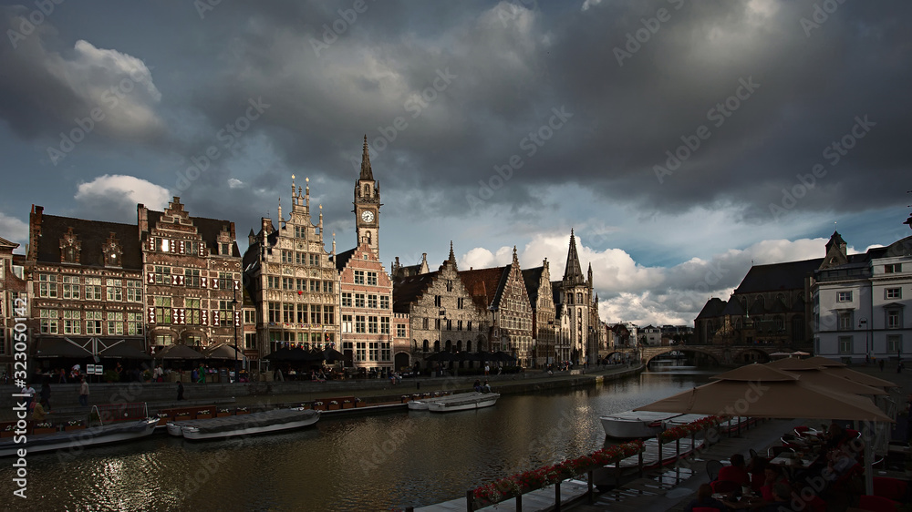 Naklejka premium Ghent, Belgium. The historic city center at sunset. Pleasant soft colors and light.