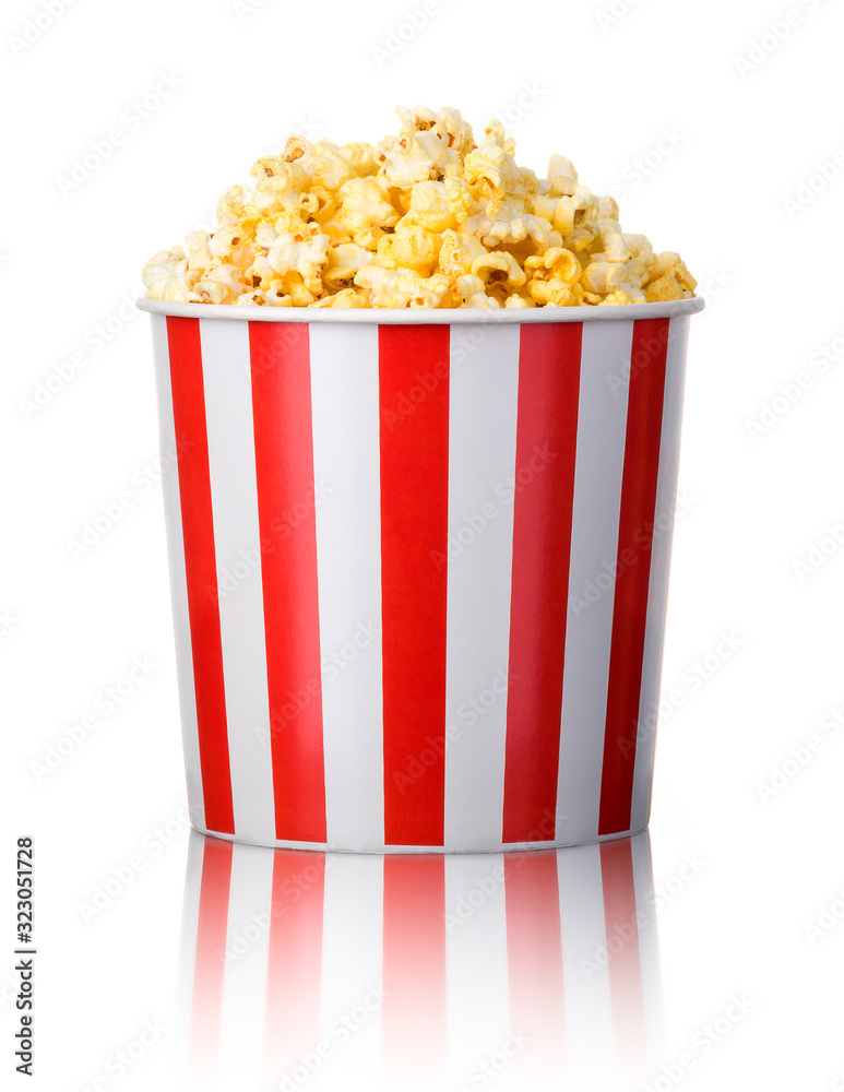 Paper striped bucket with popcorn isolated on white background Paper striped bucket with popcorn isolated on white background