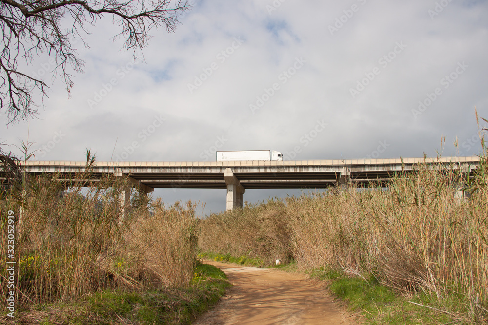 Bridge on high concrete pillars, freeway. Bridge on high concrete pillars, freeway.