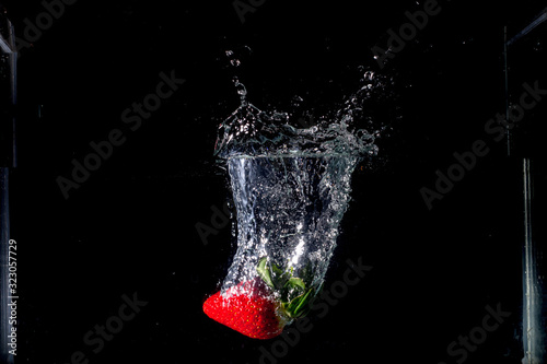 Fresh Strawberries with water splash