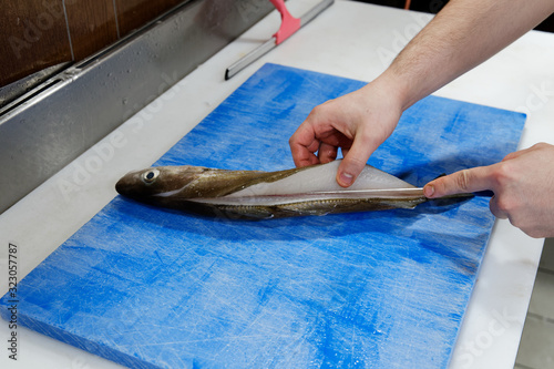 Canvas Print cleaning and filleting fish 3
