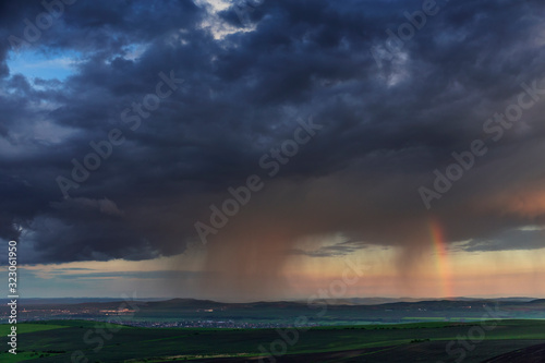 Stormy weather in spring on meadows. 