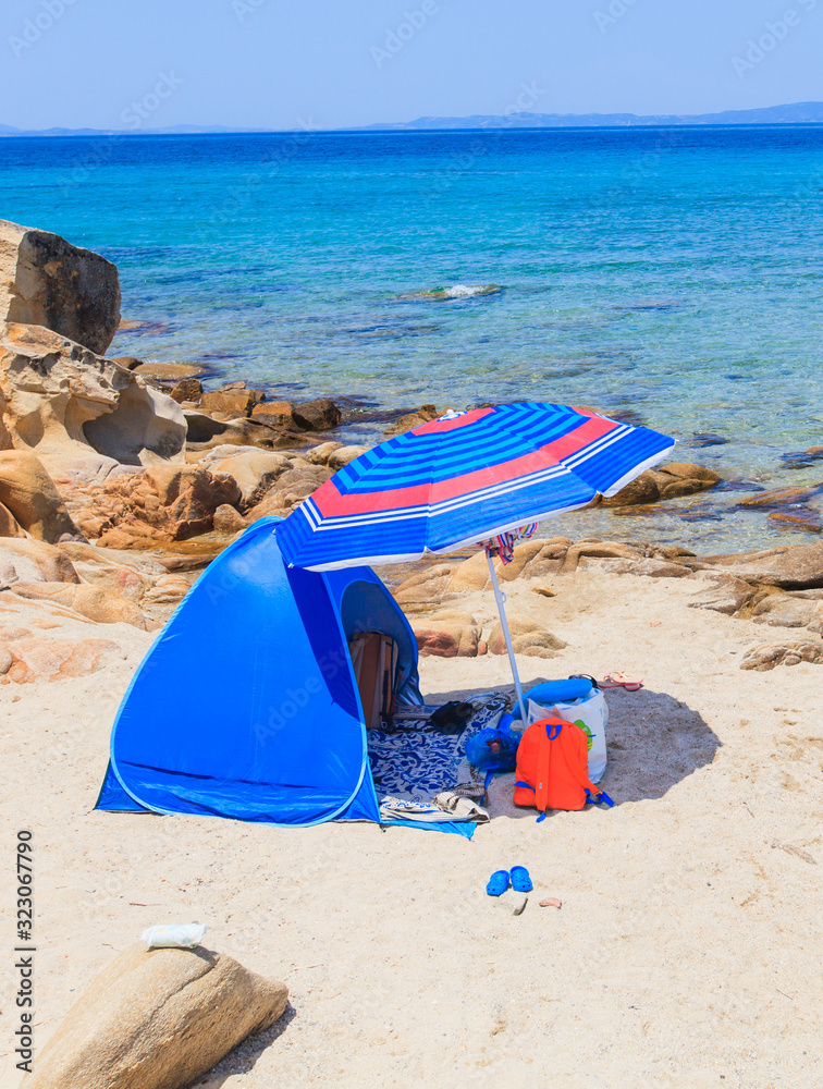 Summer travel camping on lonely sand beach