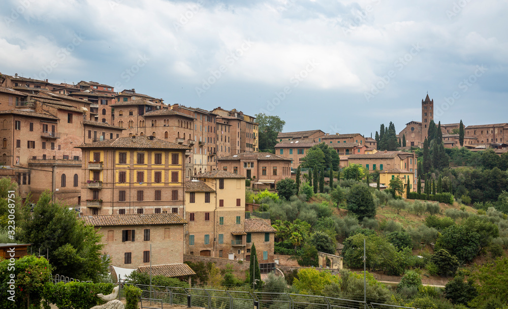a view of typical brown houses in Siena city, Tuscany, Italy