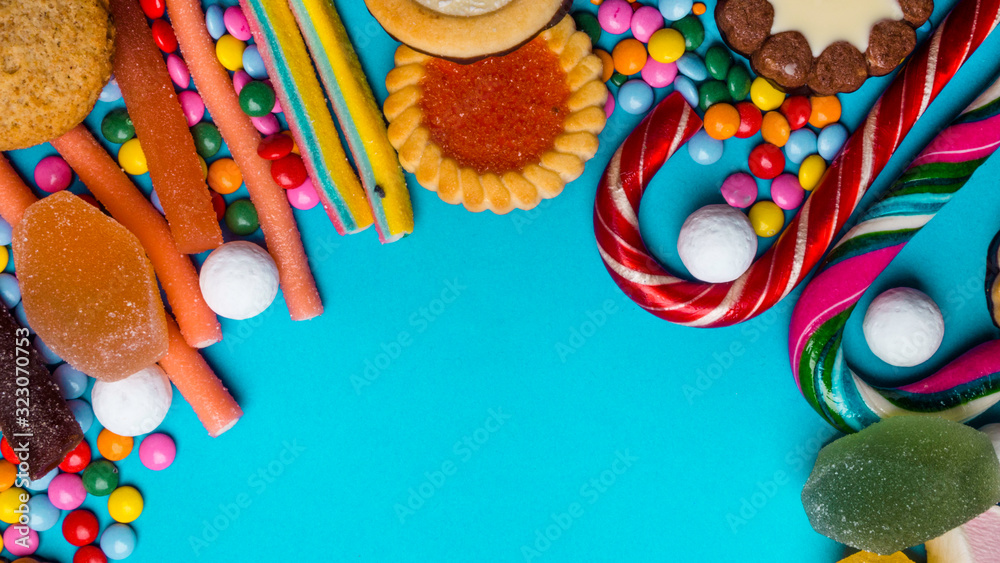 Obraz premium candy background, assortment of colorful candy, mixed unhealthy candies