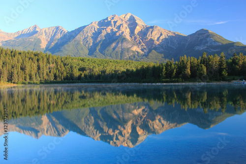 Beautiful reflection af a canadian mountain in the lake , Jasper national park, Canada
