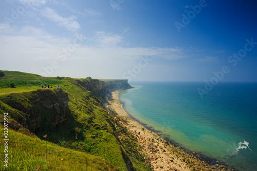 The beautiful coast of Normandy, with cliffs and access to the sea.