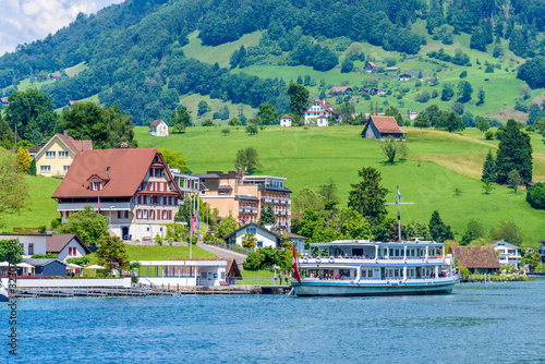 Small boat sailing on Lucerne lake, Switzerland.