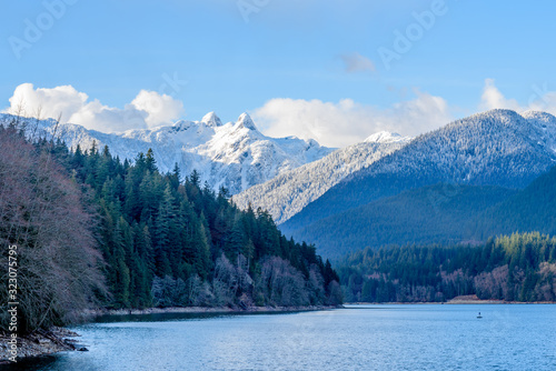 Snow Mountains and Capilano Lake in Vancouver British Columbia Pacific Northwest.