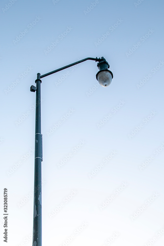 Lampost in front of a clear sky Lampost in front of a clear sky
