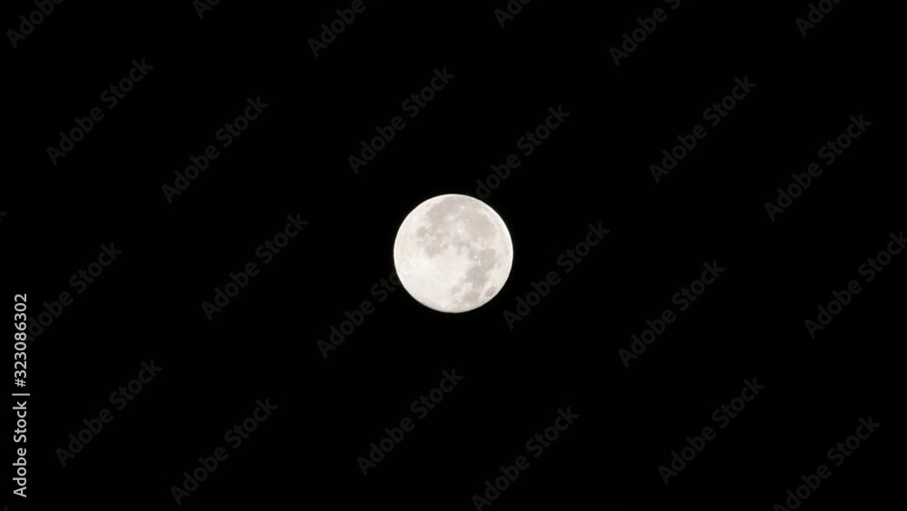 A full moon rotating on black background 4k A full moon rotating on black background 4k