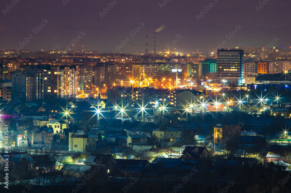 Night panorama of the city in winter