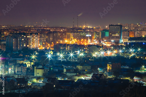 Night panorama of the city in winter