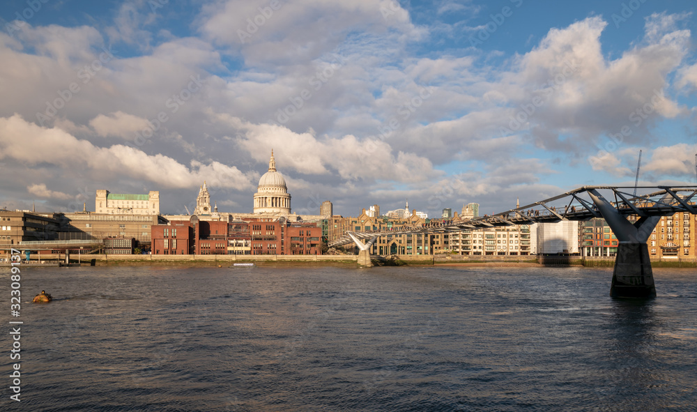 Fototapeta premium View of St Paul's Cathedral and millennium bridge over river Thames