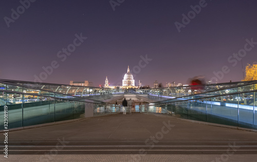 View of Millennium bridge and St Paul's Cathedral at night