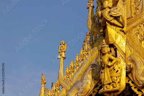 Wood carving, which has Burmese art style, is used for decorating the church's roof.