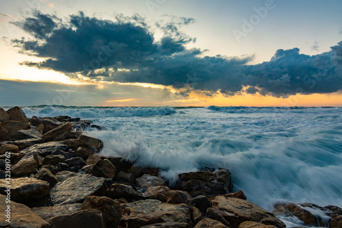 Seascape on rocky shore in storm © madhourse