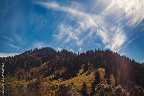 Mountain landscape with smoke on a beautiful sunny day photo