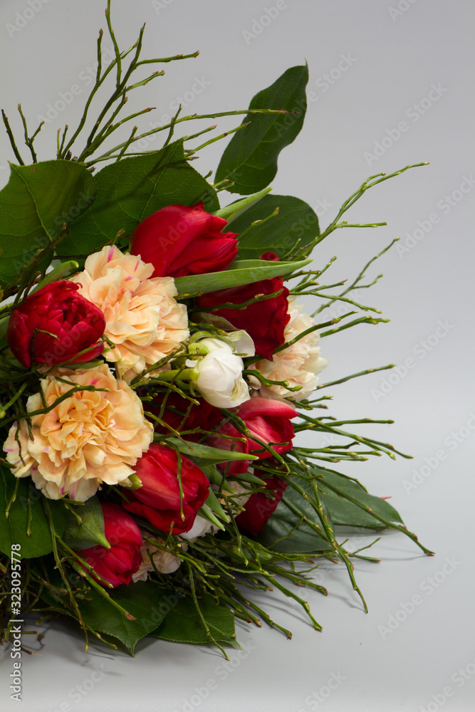 Detail closeup of beautiful bouquet in vintage style, light gray background, selective focus
