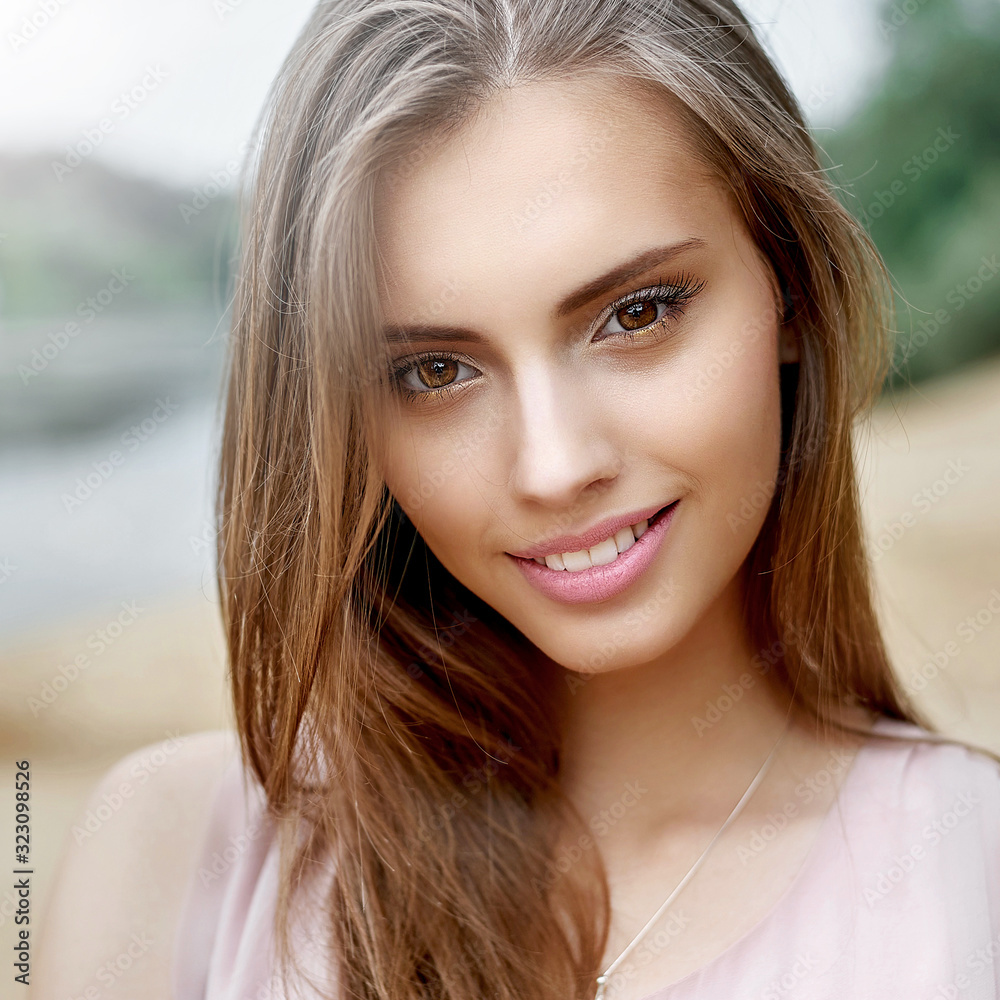 Beautiful girl face with perfect skin - close up Stock Photo | Adobe Stock