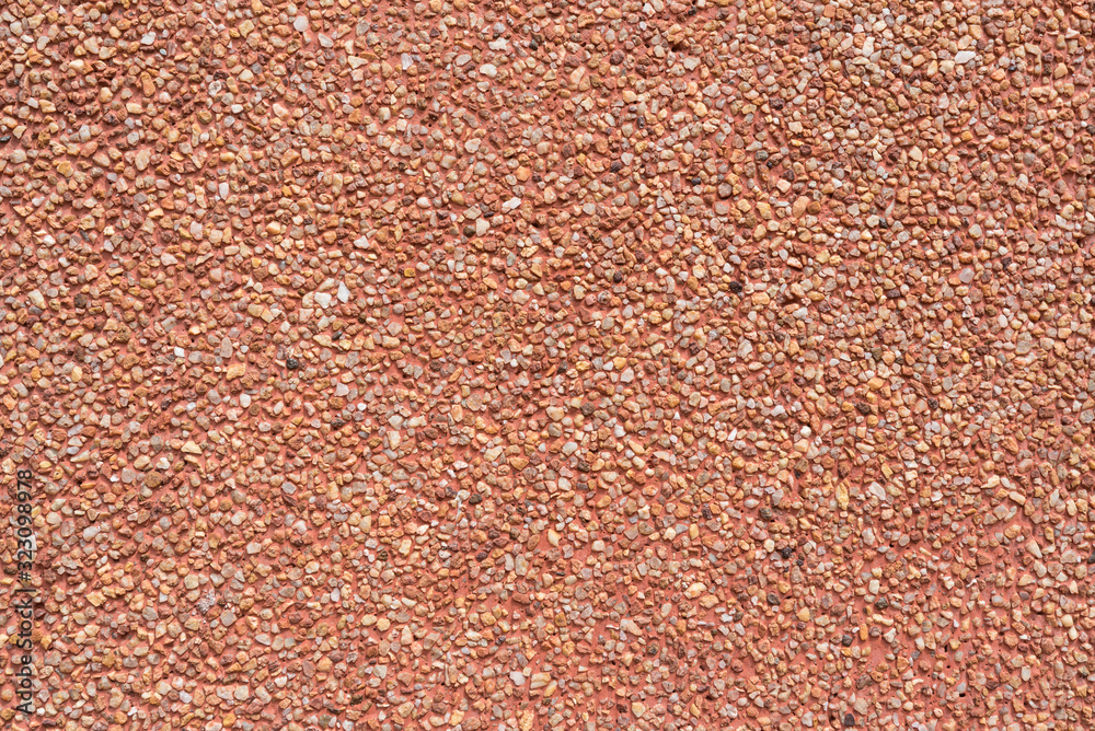 abstract scene of the wall texture in red colour with small grain rocks abstract scene of the wall texture in red colour with small grain rocks