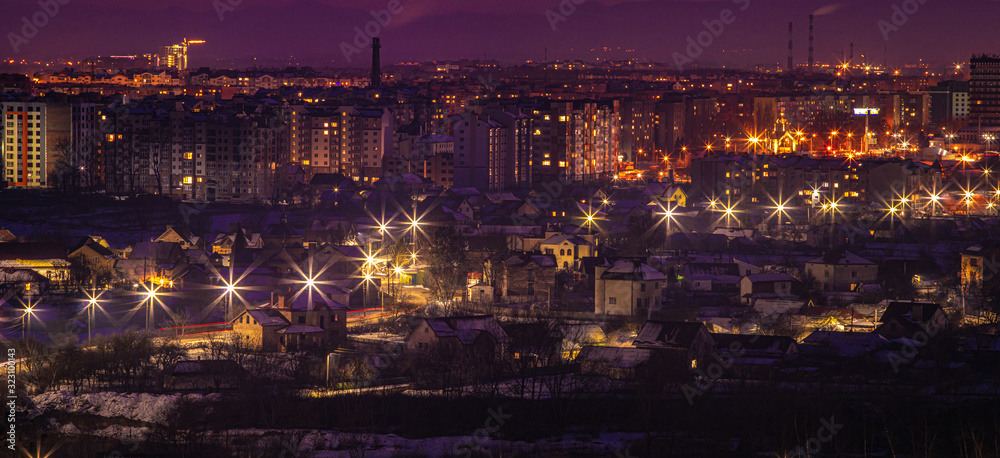 Fototapeta premium Night panorama of the city in winter