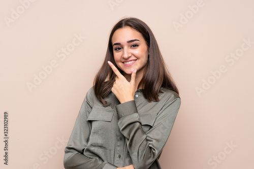 Young girl over isolated background smiling