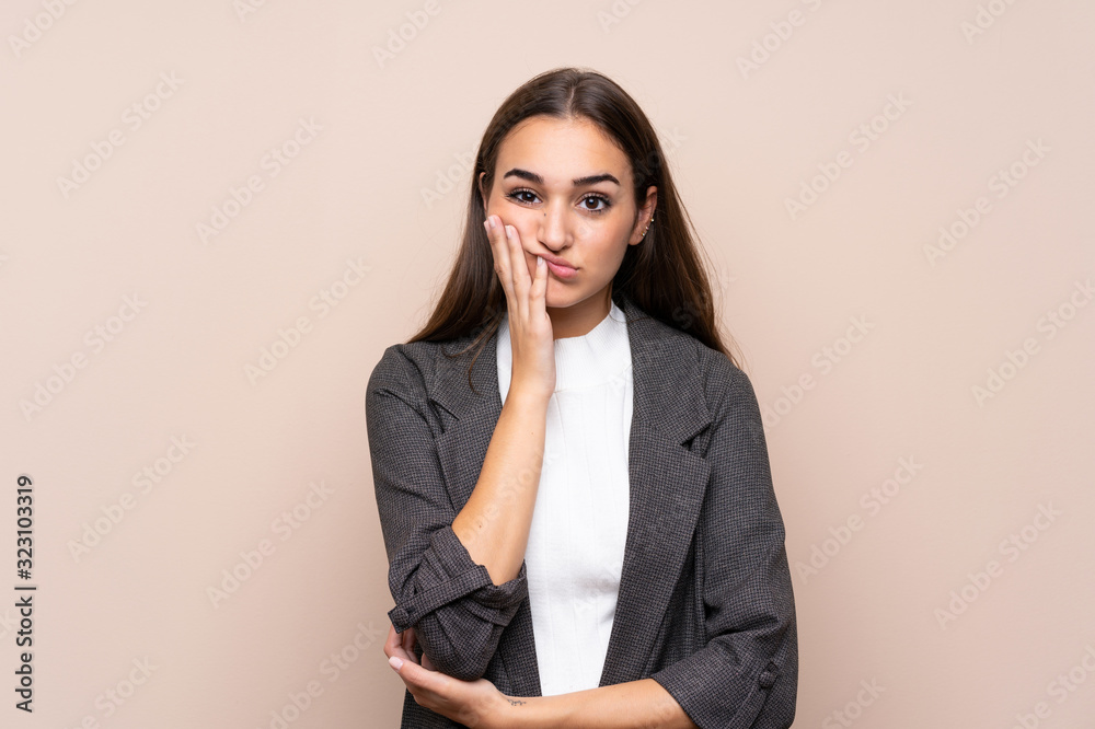 Young girl over isolated background unhappy and frustrated Young girl over isolated background unhappy and frustrated