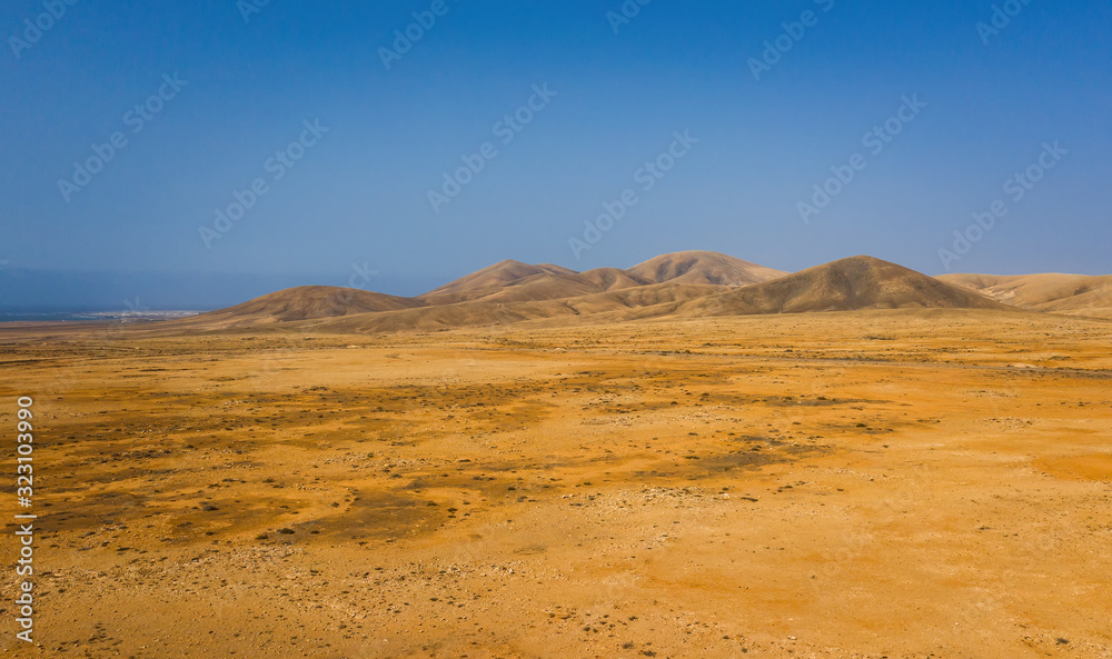 view of Tindaya Mountain in La Oliva, Fuerteventura, Canary Islands, Spain, Aerial panoramic drone view in october 2019