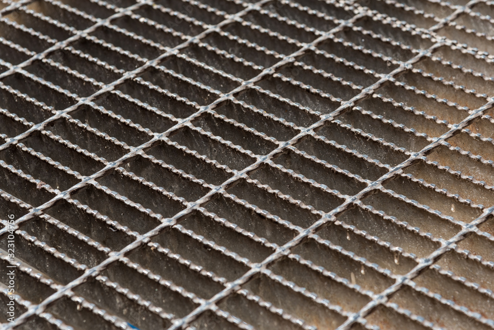 Fototapeta premium sidewalk subway grate