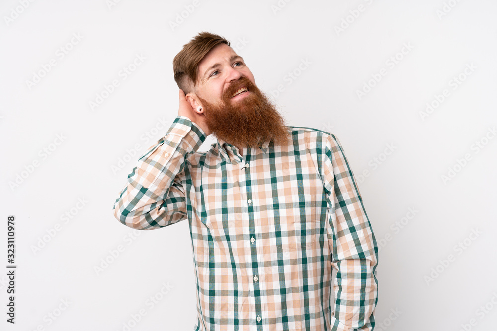 Redhead man with long beard over isolated white background thinking an idea Redhead man with long beard over isolated white background thinking an idea
